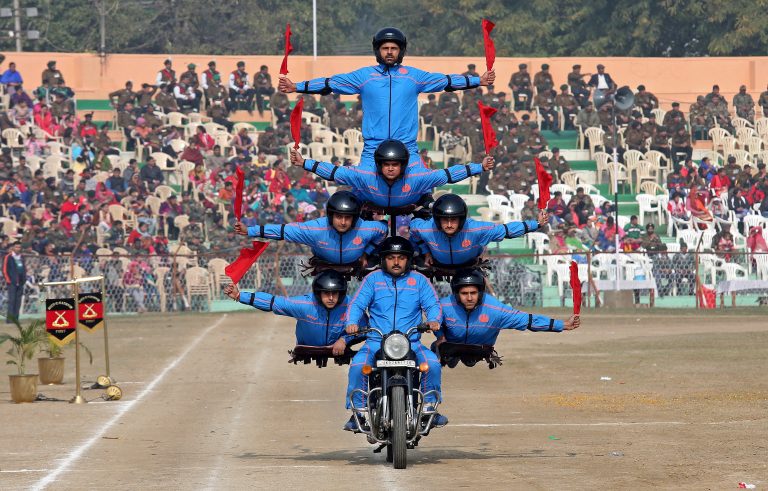 Indian police "Daredevils" motorcycle riders perform during the Republic Day celebration in Jammu