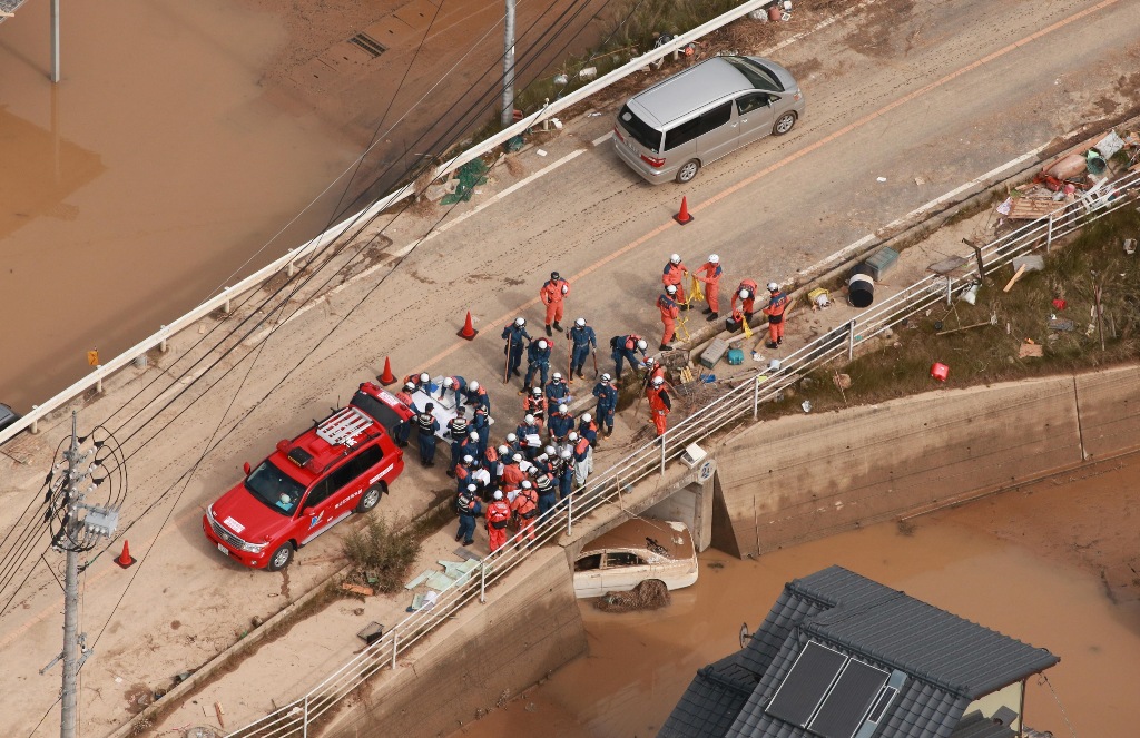 PHOTOS: 119 Dead, 81 Missing, More Than 23,000 Evacuated Due to Japan Floods