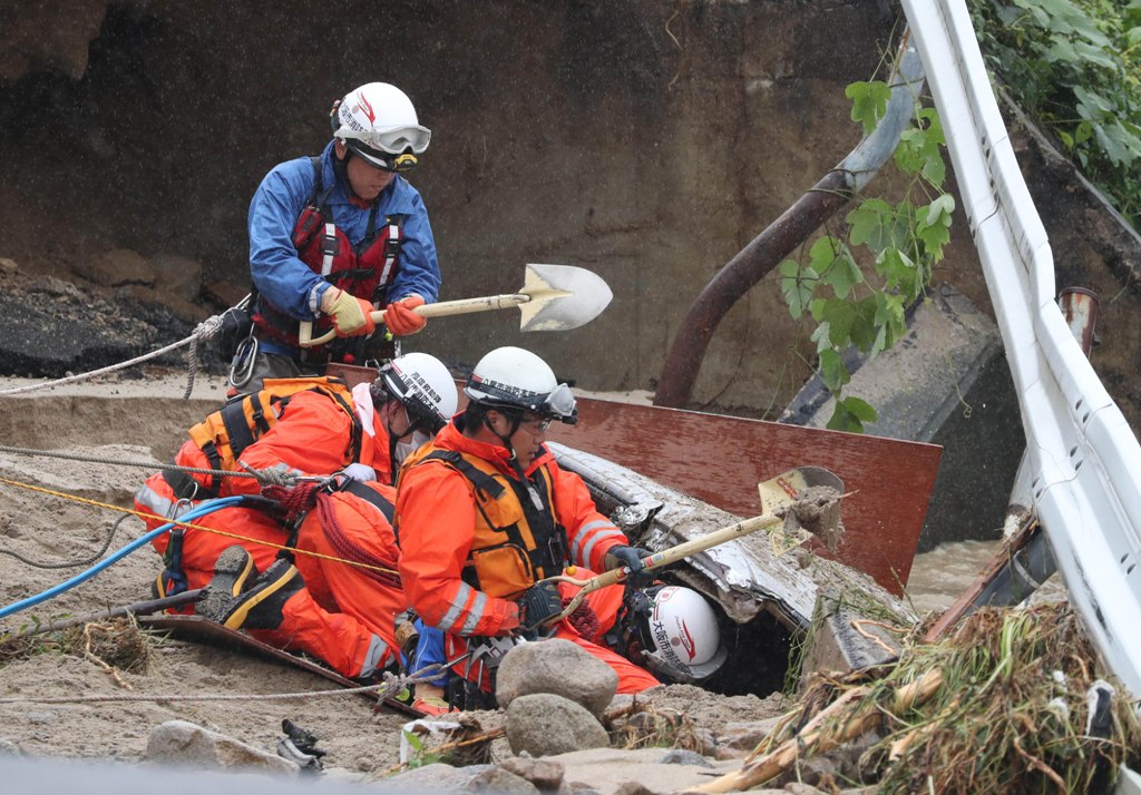 PHOTOS: 119 Dead, 81 Missing, More Than 23,000 Evacuated Due to Japan Floods