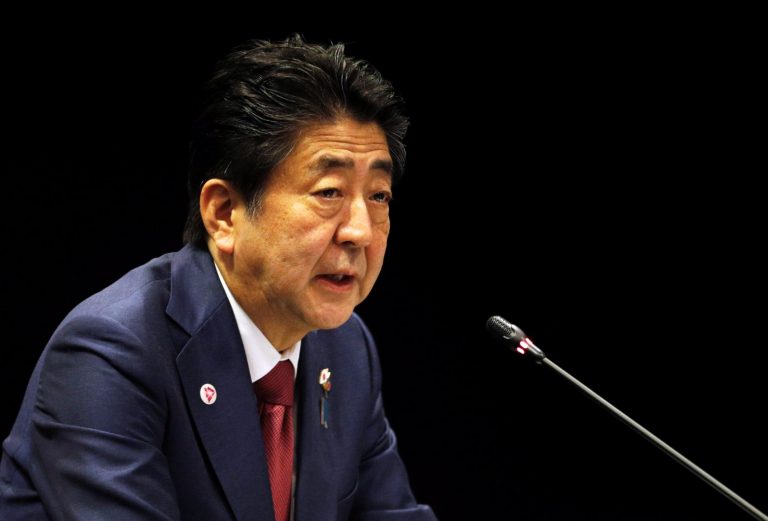 Japan's Prime Minister Shinzo Abe speaks at the ASEAN-Japan Summit in Singapore