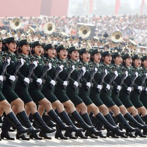 Soldiers of People's Liberation Army (PLA) march in formation during the military parade marking the 70th founding anniversary of People's Republic of China