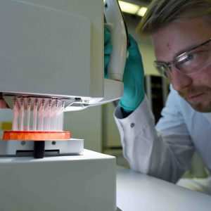 FILE PHOTO: Employee Philipp Hoffmann, of German biopharmaceutical company CureVac, demonstrates research workflow on a vaccine for the coronavirus (COVID-19) disease at a laboratory in Tuebingen