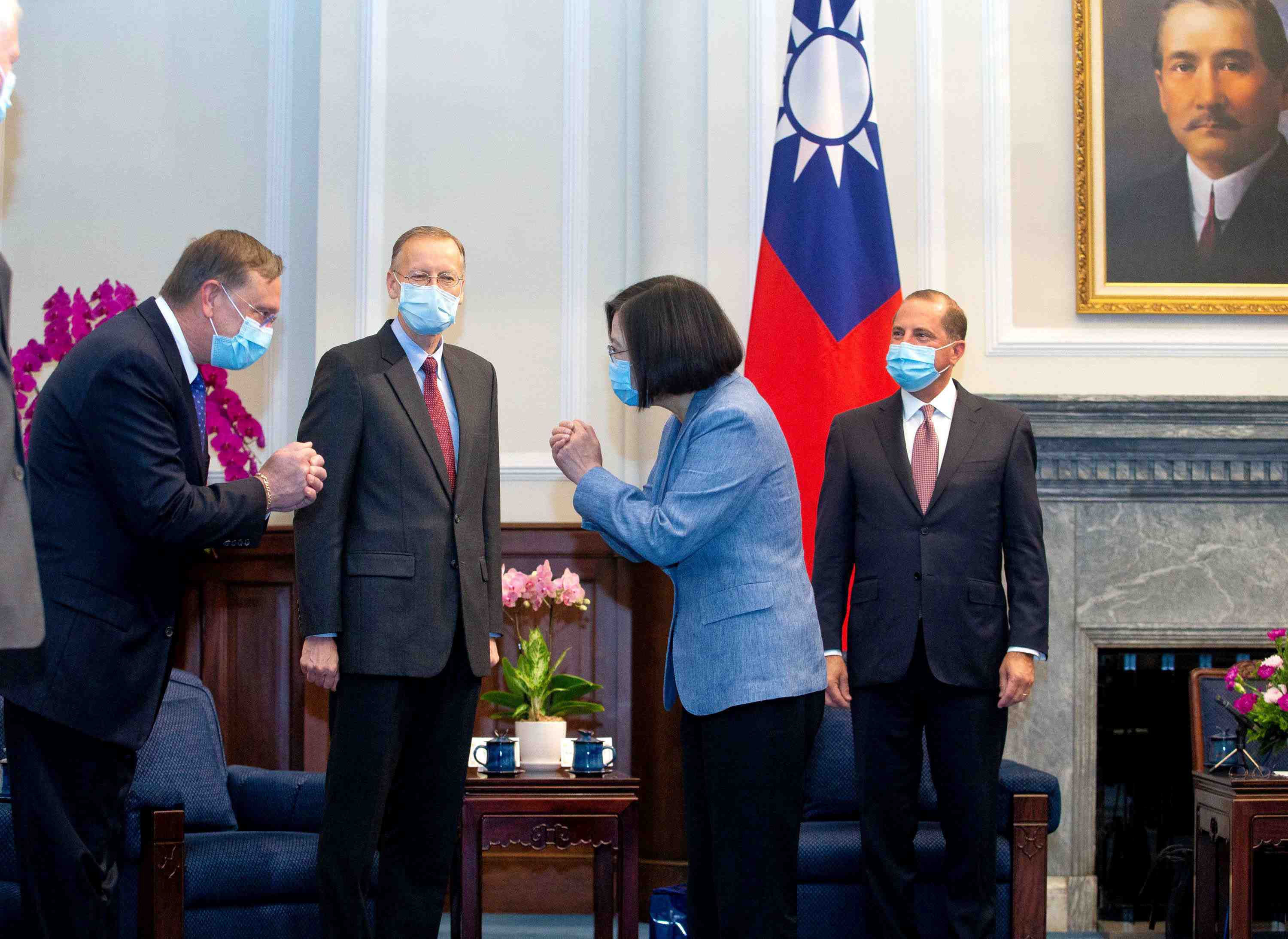 Taiwan President Tsai Ing-wen wearing a face mask meets U.S. delegation led by U.S. Secretary of Health and Human Services Alex Azar (R) at the presidential office in Taiwan