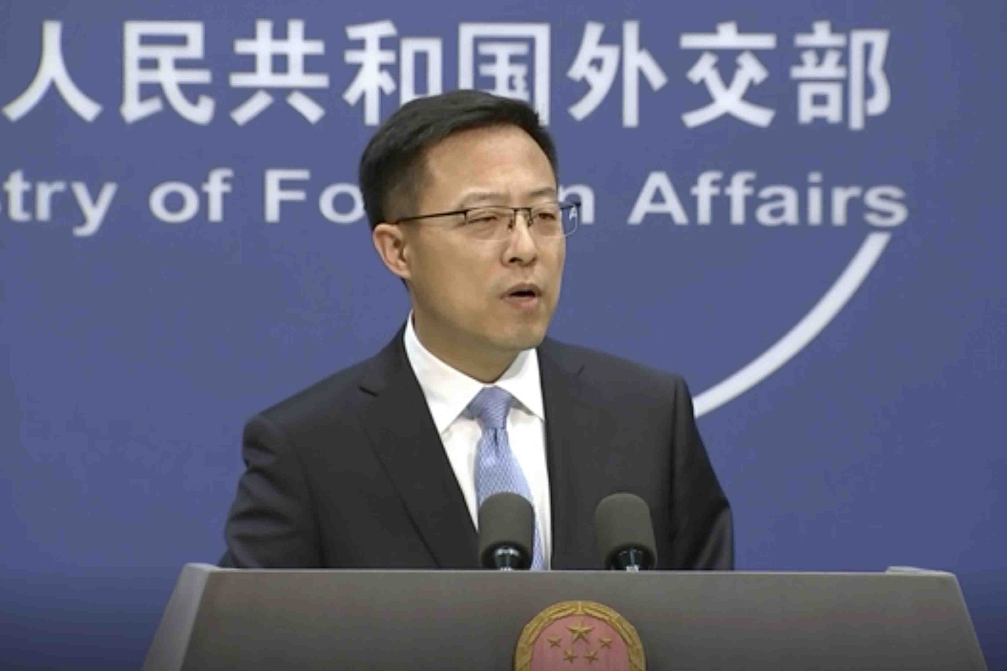 In this image from video, Chinese Foreign Ministry spokesperson Zhao Lijian speaks at a briefing in Beijing Tuesday, Nov. 17, 2020. Lijian said Australia should do something “to promote mutual trust and cooperation” between the two countries, in response to the call from Australia’s trade minister Simon Birmingham for dialogue and discussion with China to stop the trade disruptions over tensions. Australia is the first country to ban China's Huawei from its 5G network and Canberra led a global effort calling for an independent probe into the origins of the COVID-19 pandemic, which first emerged in China’s Wuhan city. (AP Photo)