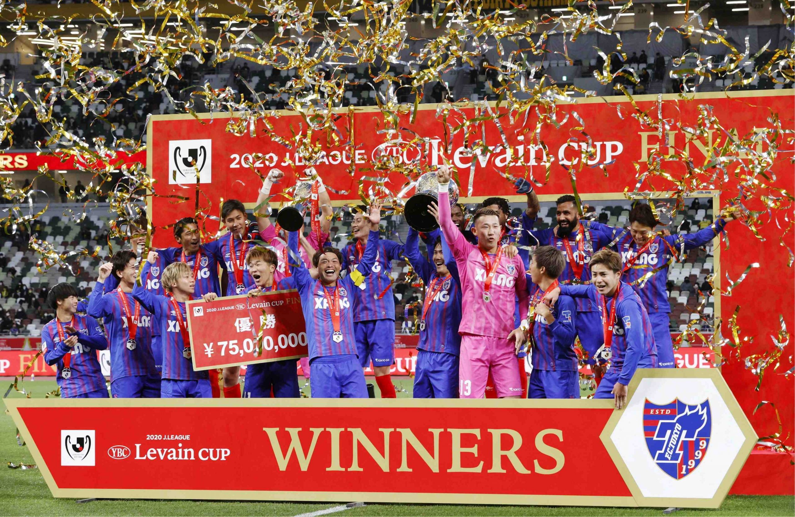 FC Tokyo's players celebrate their victory after the J.League YBC