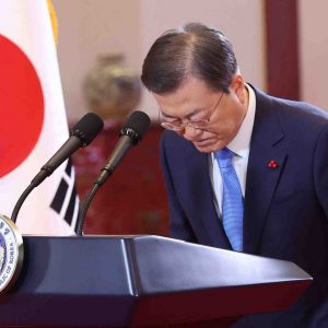 South Korean President Moon Jae-in bows before delivering the New Year's address at the Presidential Blue House in Seoul