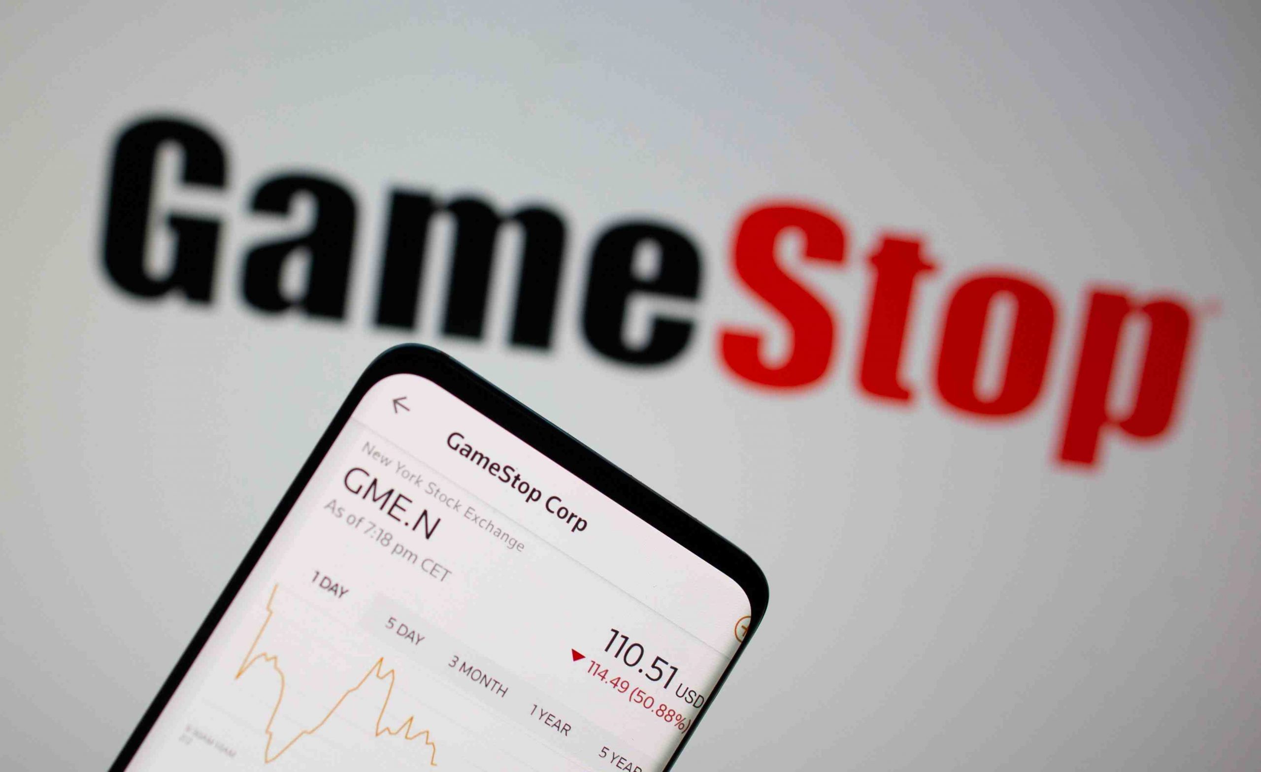 gamestop-stock-graph-is-seen-in-front-of-the-company-s-logo-japan-forward