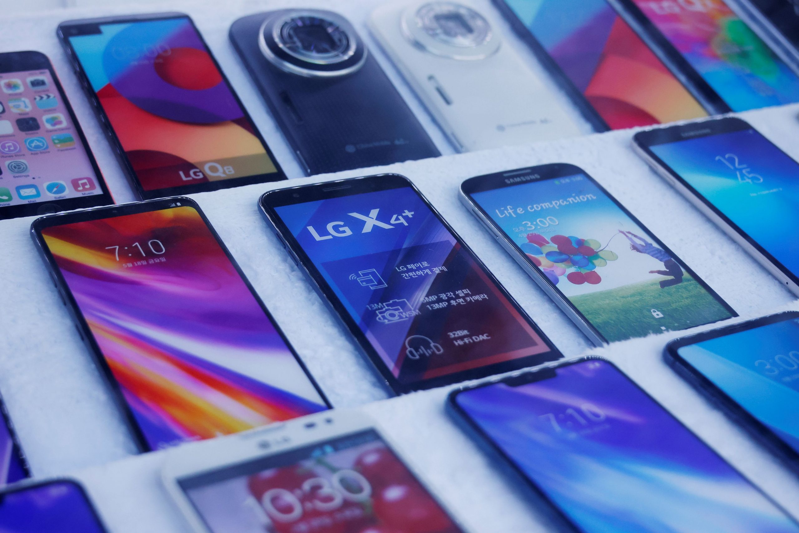 Mock old version LG Electronics' smartphones are displayed at a