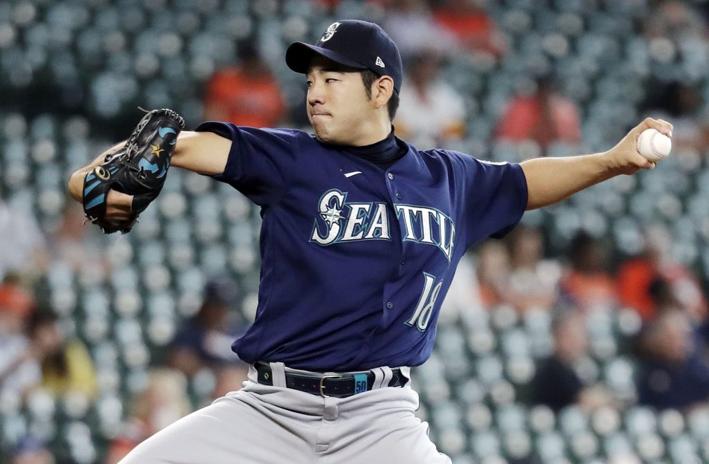 Japan pitcher Yusei Kikuchi arrives in L.A. for talks on playing