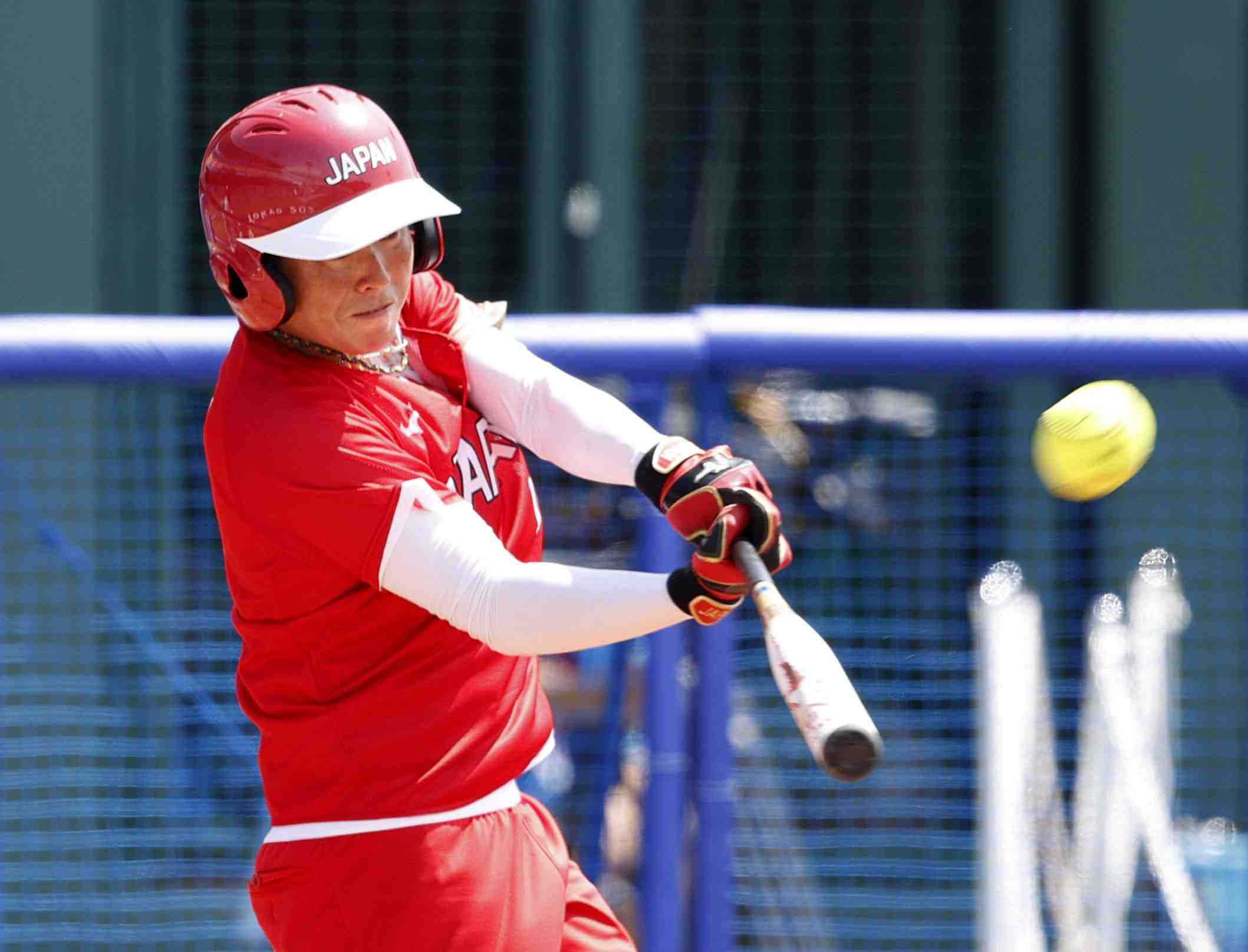 SOFTBALL Japan Trounces Australia in Opening Game JAPAN Forward