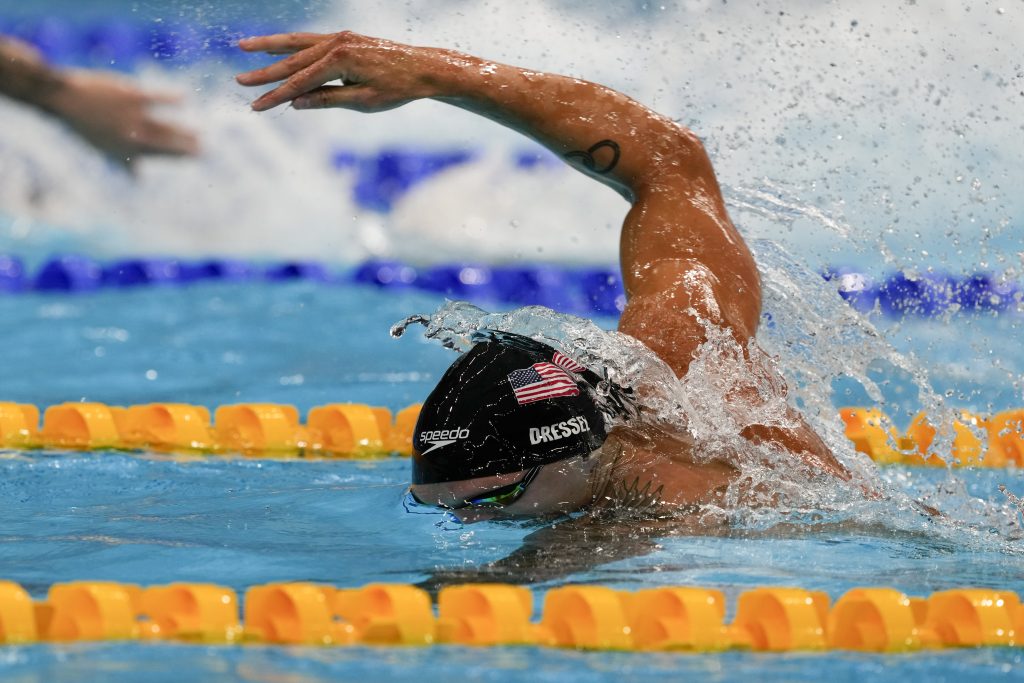 SWIMMING American Caeleb Dressel Breaks Olympic Record in 100Meter