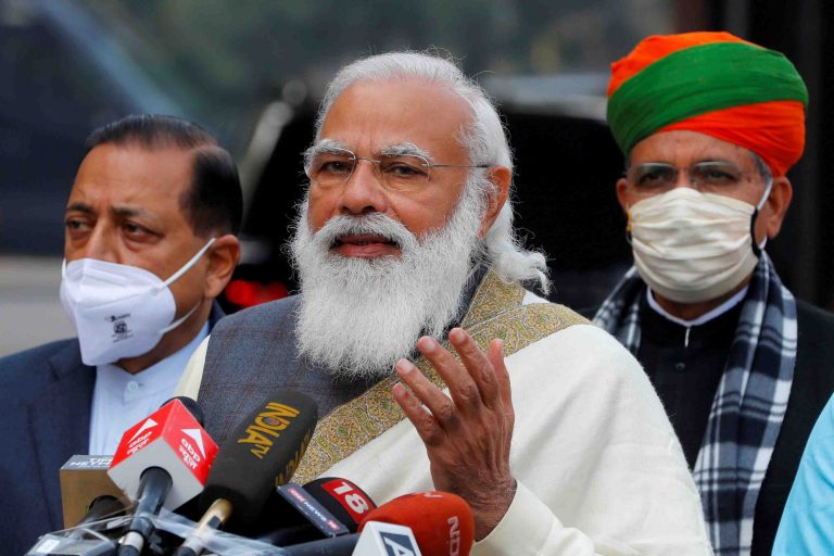 FILE PHOTO: FILE PHOTO: India's Prime Minister Narendra Modi arrives at the parliament house to attend the first day of the budget session, in New Delhi