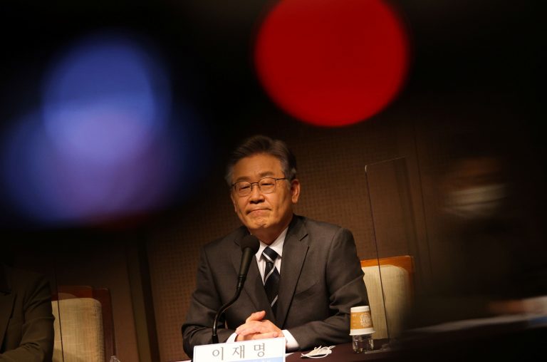 Lee Jae-myung, the upcoming 2022 presidential election candidate of the ruling Democratic Party, attends a news conference in Seoul