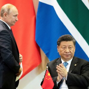 FILE PHOTO: China's President Xi Jinping and Russia's President Vladimir Putin attend a meeting with members of the Business Council and management of the New Development Bank during the BRICS emerging economies at the Itamaraty palace in Brasilia