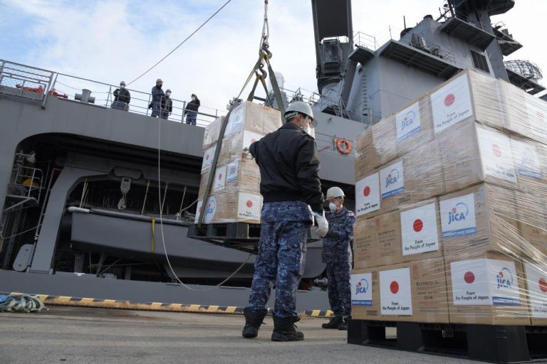 Japan Self Defense Force JS Osumi loads relief supplies for Tonga