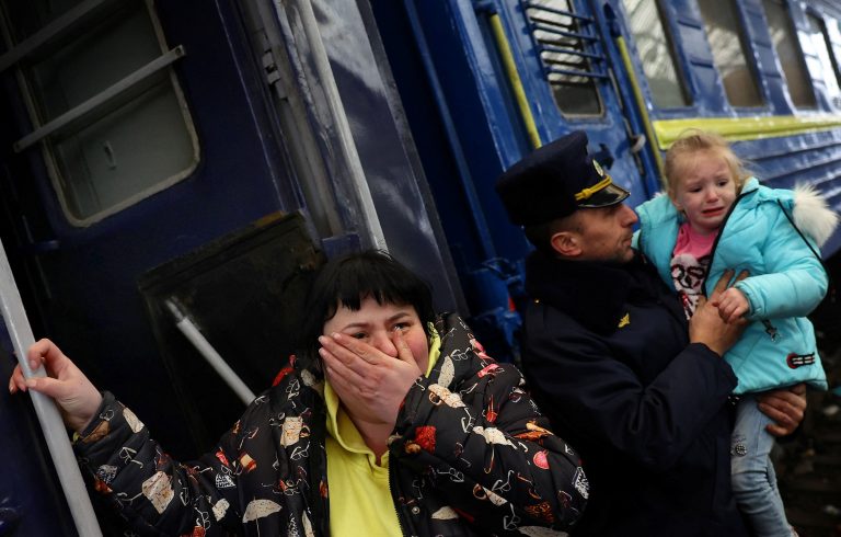 Refugees fleeing the Russian invasion wait for trains to Poland in Lviv