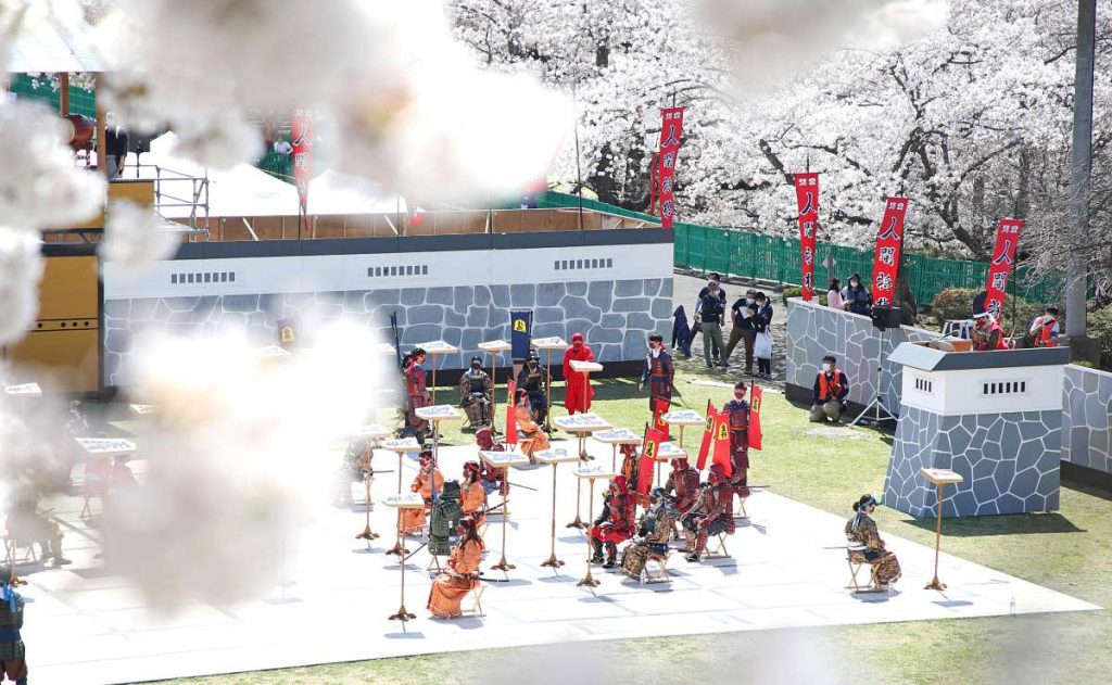 Local high school students perform Ningen Shogi, human Japanese chess on  top of Mt. Maizuru, in Tendo, Yamagata Prefecture on April 22, 2017. Tendo  is known for production of shogi koma,'' pieces